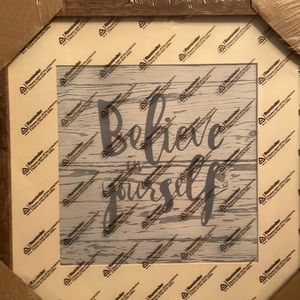 New in wrapping. Framed saying “Believe in yourself “. Can hang or display.
